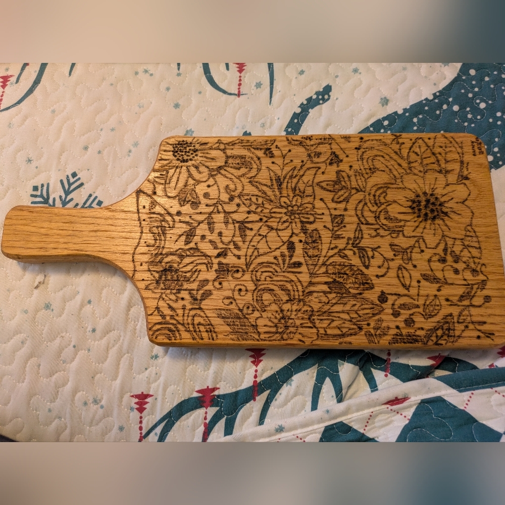 Wood burned decorative cutting board.
